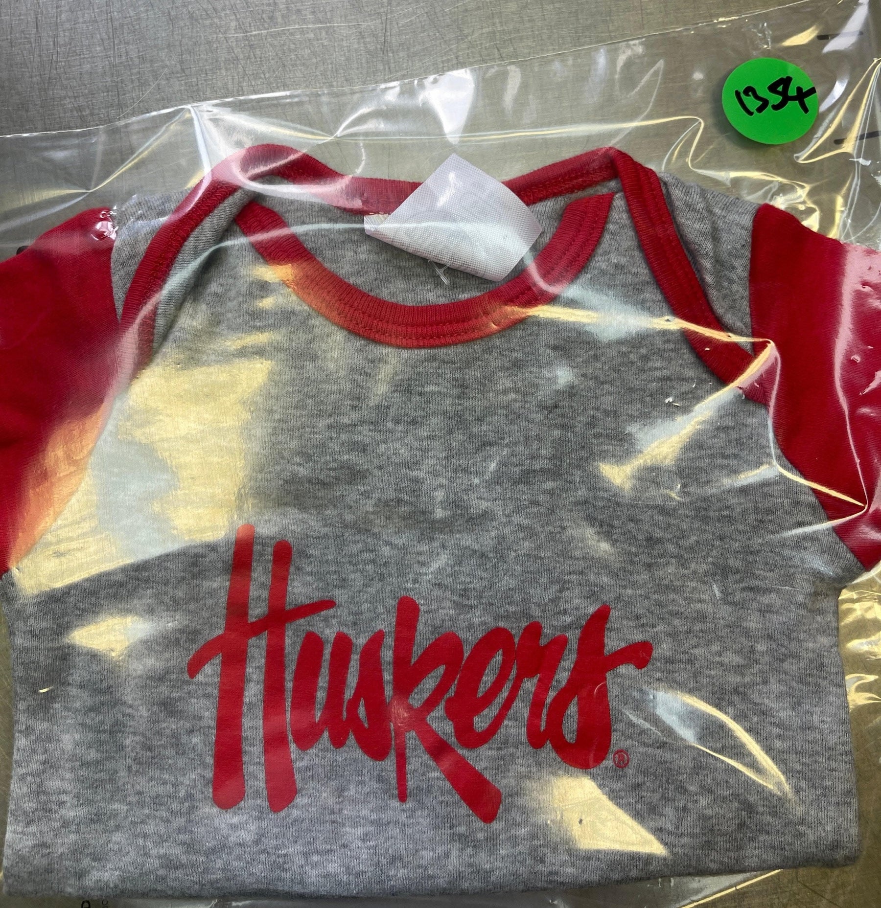 NCAA Nebraska Cornhuskers Grey Bodysuit 0-3 months