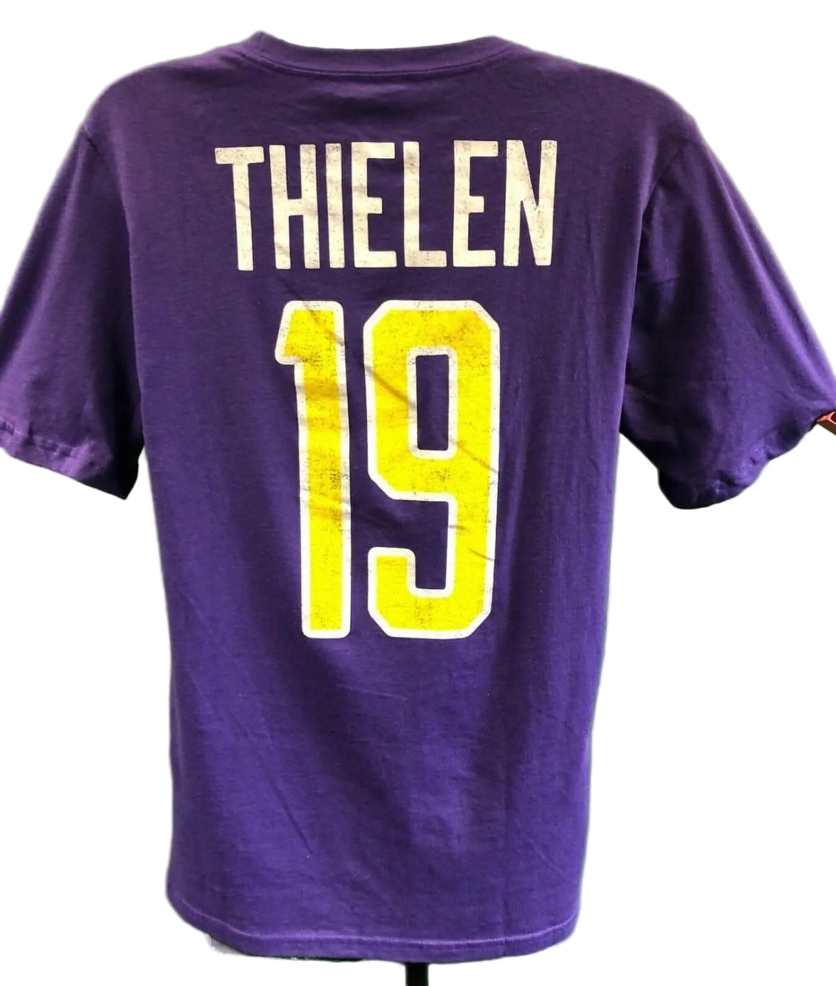 Purple t-shirt with 'THIELEN 19' printed on the back against a white background
