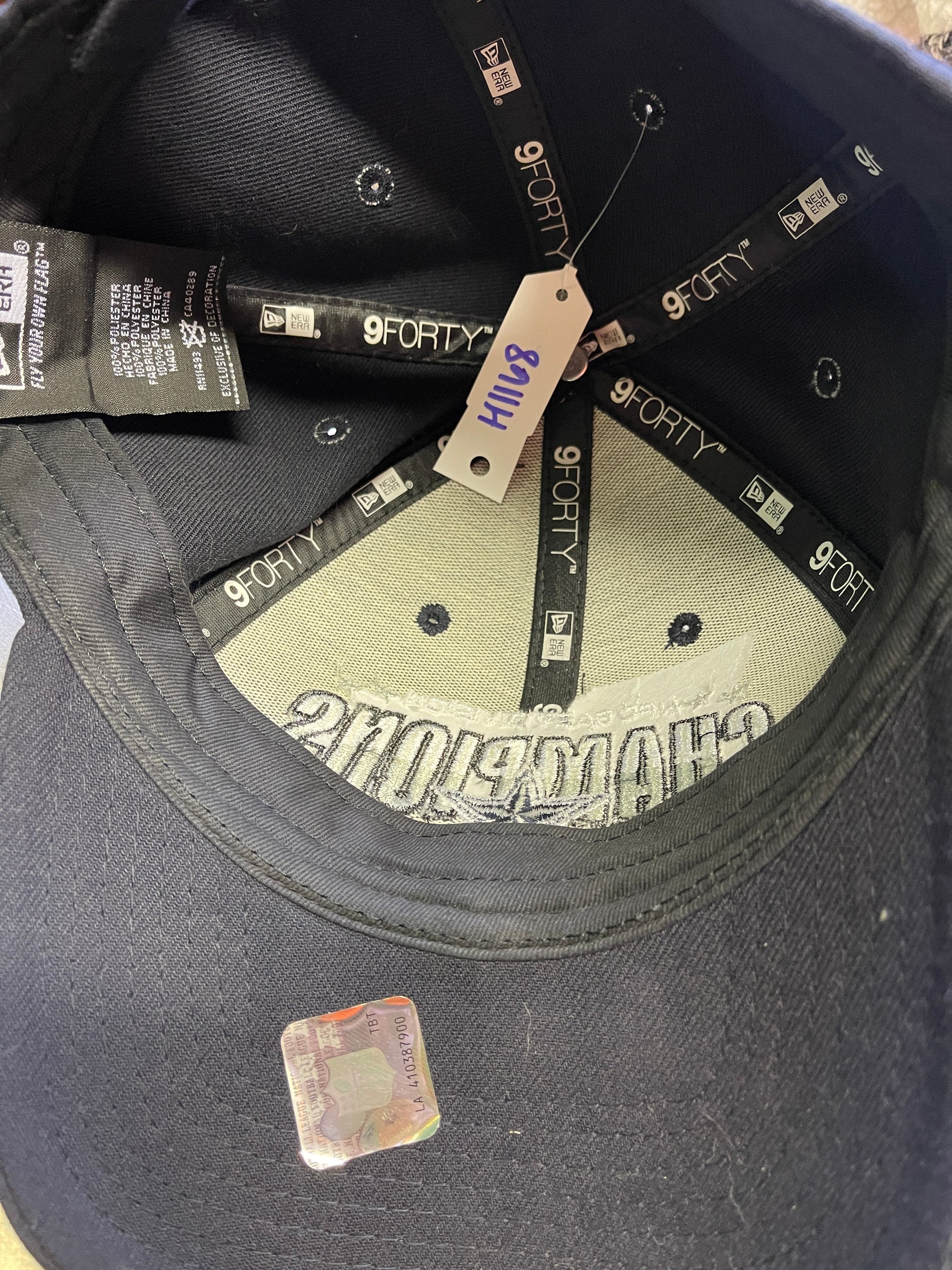 NFL Dallas Cowboys New Era 9FORTY NFC East Champions Strapback Hat Adult OSFM